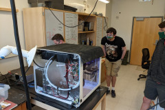 Undergraduates researching advanced additive manufacturing techniques