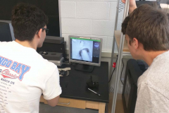 Students learn how to use the scanning electron microscope.